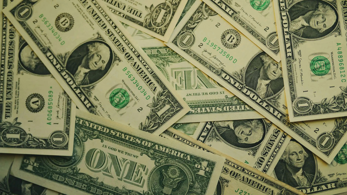 Pile of one-dollar notes symbolizing capital flowing into AI grid tech