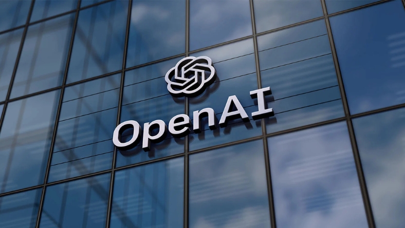 OpenAI logo displayed on the exterior of a modern glass office building