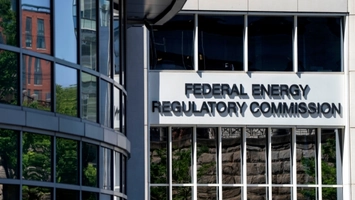 Federal Energy Regulatory Commission building exterior with agency name displayed on a white facade panel
